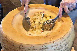 Pulling Corks and Forks — 50-lb Cheese Wheel